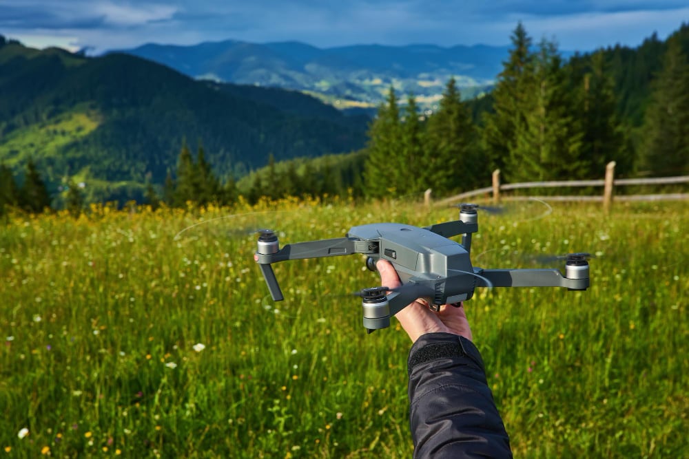 Drone ready for take-off above open country